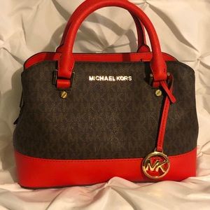 Red and brown Michael Kors purse